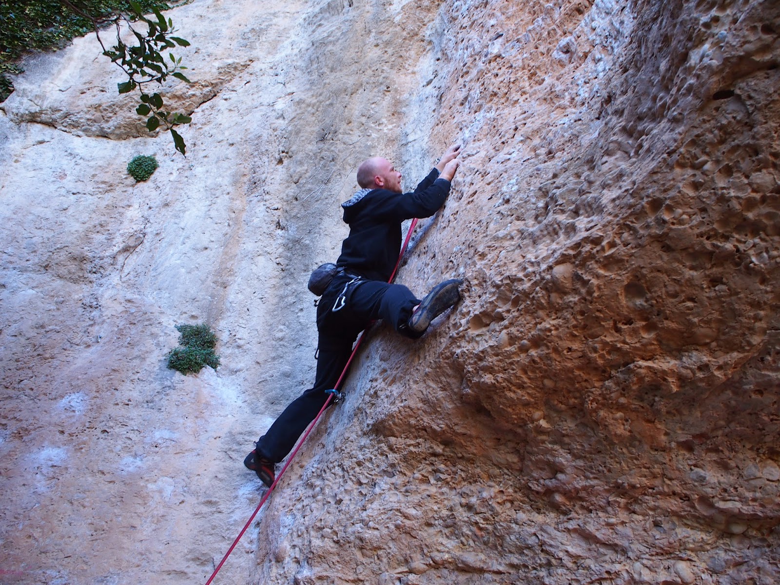 Mykolas easily moving on a strange 6b in Margalef