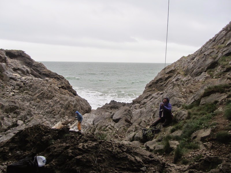 Anna belaying and the sea roaring