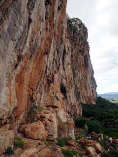 Laura on some wet 7a+