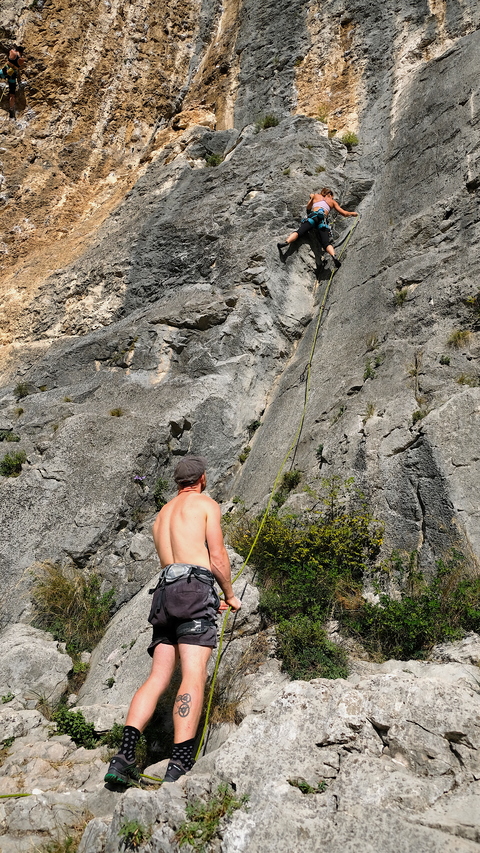 Mykolas in nice socks belaying me on a nasty slab